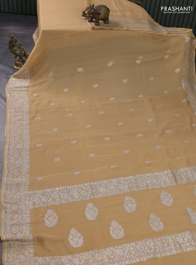 Banarasi chiffon silk saree sandal with silver zari woven buttas and floral silver zari woven border