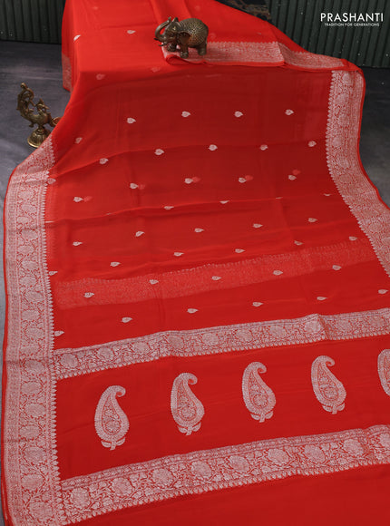 Banarasi chiffon silk saree orange with silver zari woven buttas and floral silver zari woven border