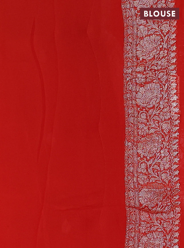 Banarasi chiffon silk saree orange with silver zari woven buttas and floral silver zari woven border