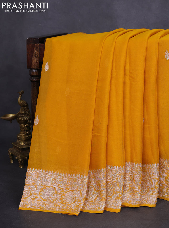 Banarasi chiffon silk saree mustard yellow with silver zari woven buttas and floral silver zari woven border