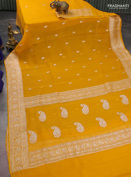 Banarasi chiffon silk saree mustard yellow with silver zari woven buttas and floral silver zari woven border