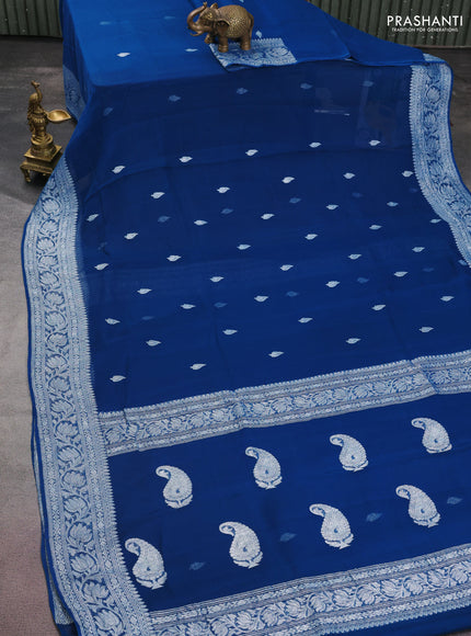 Banarasi chiffon silk saree peacock blue with silver zari woven buttas and floral silver zari woven border