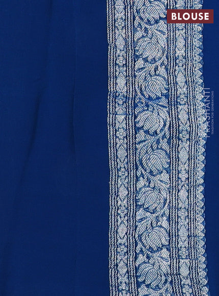Banarasi chiffon silk saree peacock blue with silver zari woven buttas and floral silver zari woven border