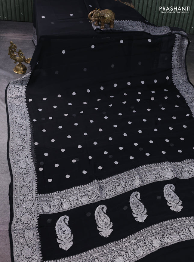 Banarasi chiffon silk saree black with silver zari woven coin buttas and silver zari woven border