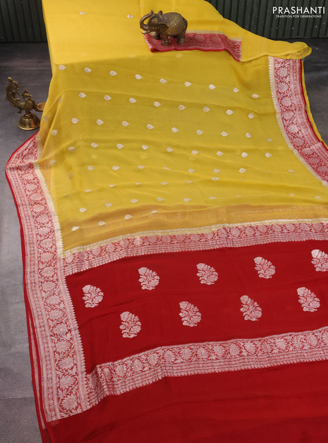 Banarasi chiffon silk saree yellow and kumkum red with silver zari woven buttas and silver zari woven border