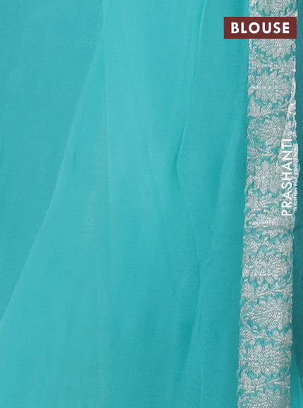 Banarasi chiffon silk saree bottle green and teal blue with silver zari woven buttas and silver zari woven border
