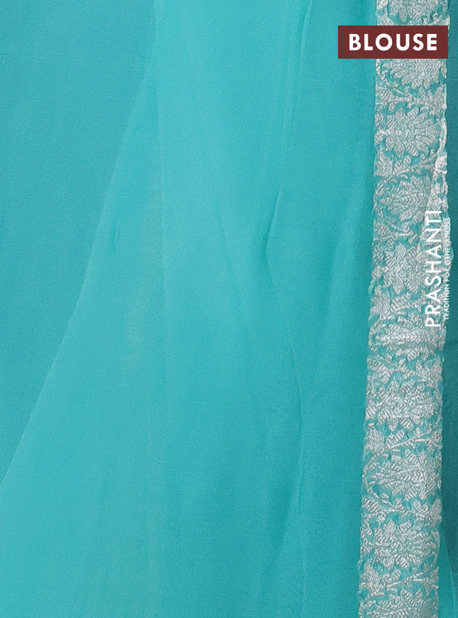 Banarasi chiffon silk saree bottle green and teal blue with silver zari woven buttas and silver zari woven border