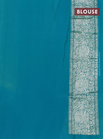 Banarasi chiffon silk saree lime yellow and teal blue with silver zari woven buttas and silver zari woven border
