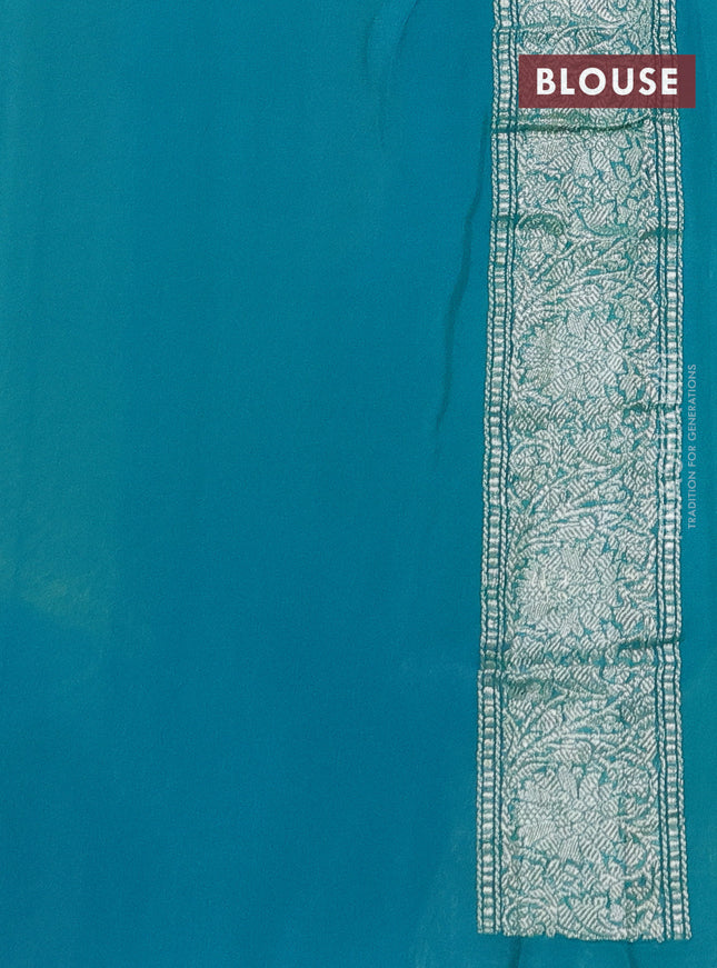 Banarasi chiffon silk saree lime yellow and teal blue with silver zari woven buttas and silver zari woven border
