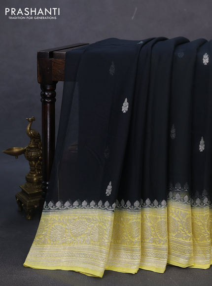 Banarasi chiffon silk saree black and pale yellow with silver zari woven buttas and silver zari woven border