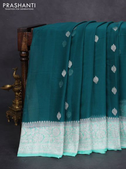 Banarasi chiffon silk saree peacock green and teal green shade with silver zari woven buttas and floral silver zari woven border