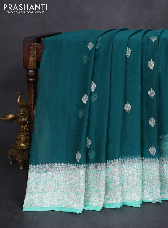 Banarasi chiffon silk saree peacock green and teal green shade with silver zari woven buttas and floral silver zari woven border