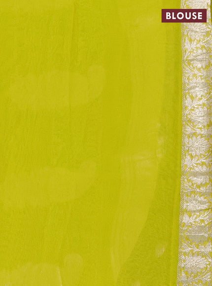 Banarasi chiffon silk saree black and yellow with paisley silver zari woven buttas and floral silver zari woven border