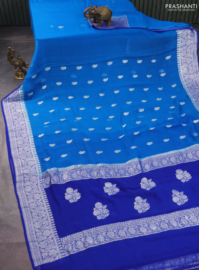 Banarasi chiffon silk saree cs blue and blue with paisley silver zari woven buttas and floral silver zari woven border