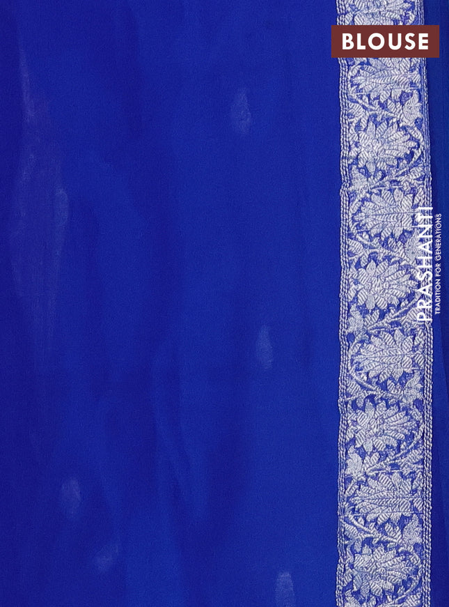Banarasi chiffon silk saree cs blue and blue with paisley silver zari woven buttas and floral silver zari woven border