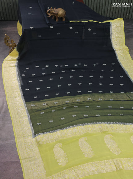 Banarasi chiffon silk saree black and pale yellow with silver zari woven buttas and floral silver zari woven border
