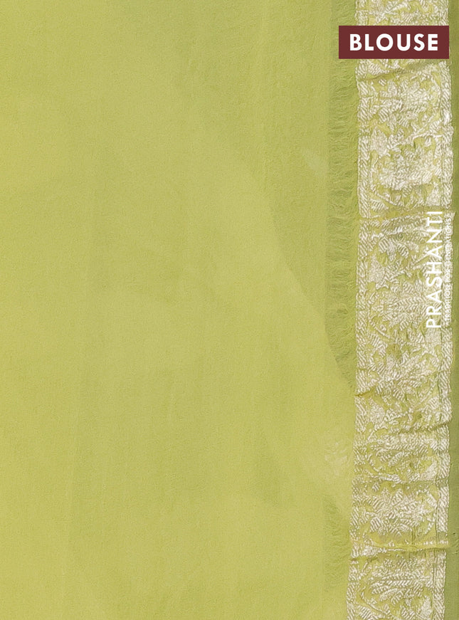 Banarasi chiffon silk saree black and pale yellow with silver zari woven buttas and floral silver zari woven border