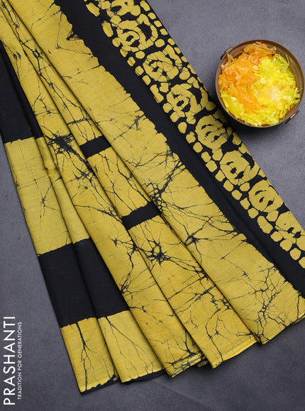 Jaipur cotton saree black and mustard yellow with batik prints and printed border