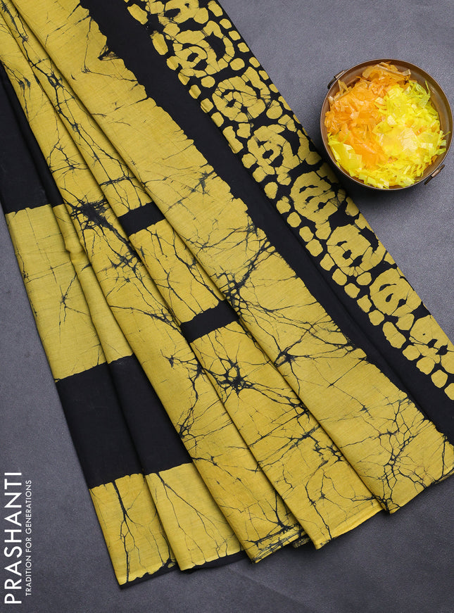 Jaipur cotton saree black and mustard yellow with batik prints and printed border