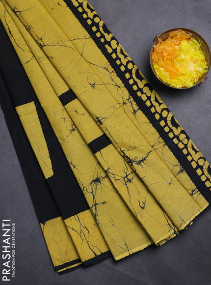 Jaipur cotton saree black and mustard yellow with batik prints and printed border
