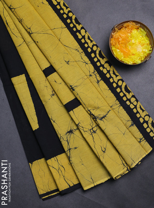 Jaipur cotton saree black and mustard yellow with batik prints and printed border