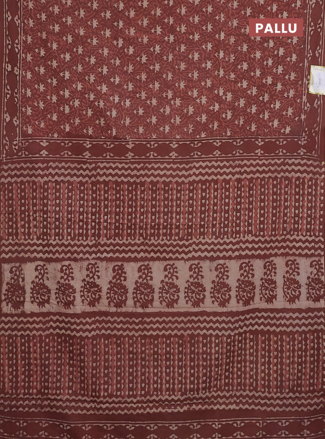 Jaipur cotton saree rust shade with allover dabu prints and printed border