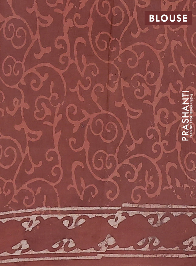 Jaipur cotton saree rust shade with allover dabu prints and printed border