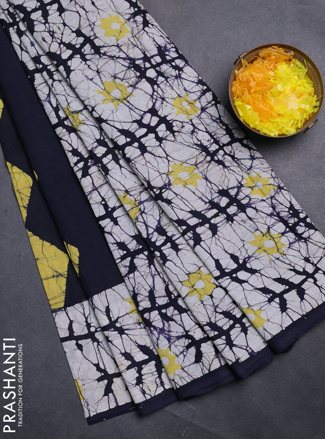 Jaipur cotton saree navy blue and off white with allover batik prints and printed border