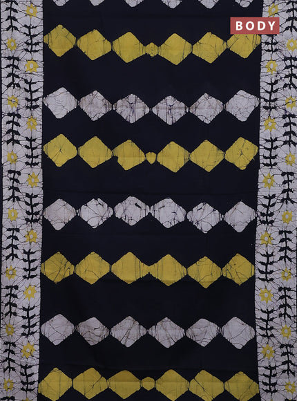 Jaipur cotton saree navy blue and off white with allover batik prints and printed border