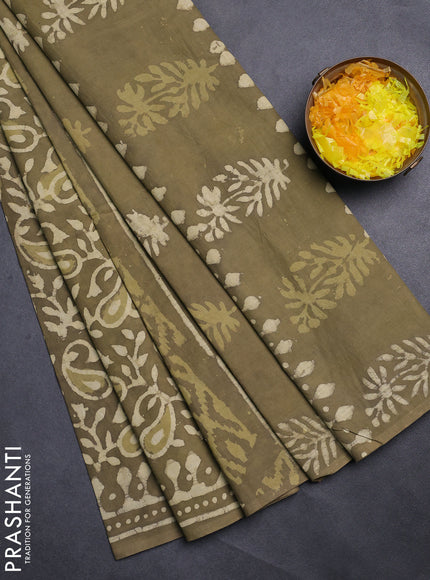 Jaipur cotton saree mahendi green with alovver dabu prints and printed border
