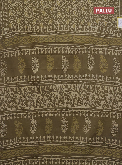 Jaipur cotton saree mahendi green with alovver dabu prints and printed border