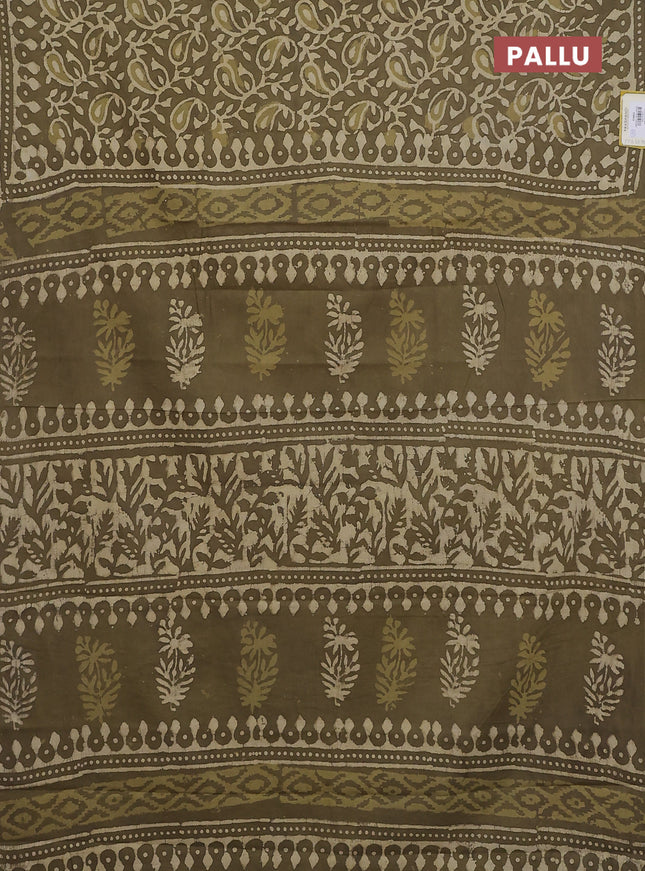 Jaipur cotton saree mahendi green with alovver dabu prints and printed border