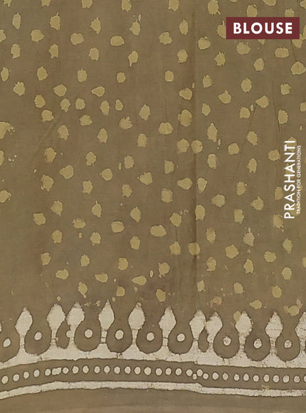 Jaipur cotton saree mahendi green with alovver dabu prints and printed border