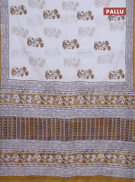 Jaipur cotton saree off white and mustard with floral butta prints and printed border