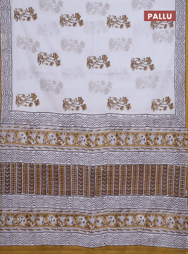Jaipur cotton saree off white and mustard with floral butta prints and printed border