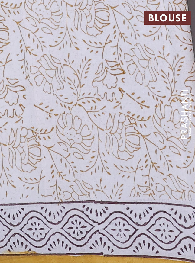 Jaipur cotton saree off white and mustard with floral butta prints and printed border
