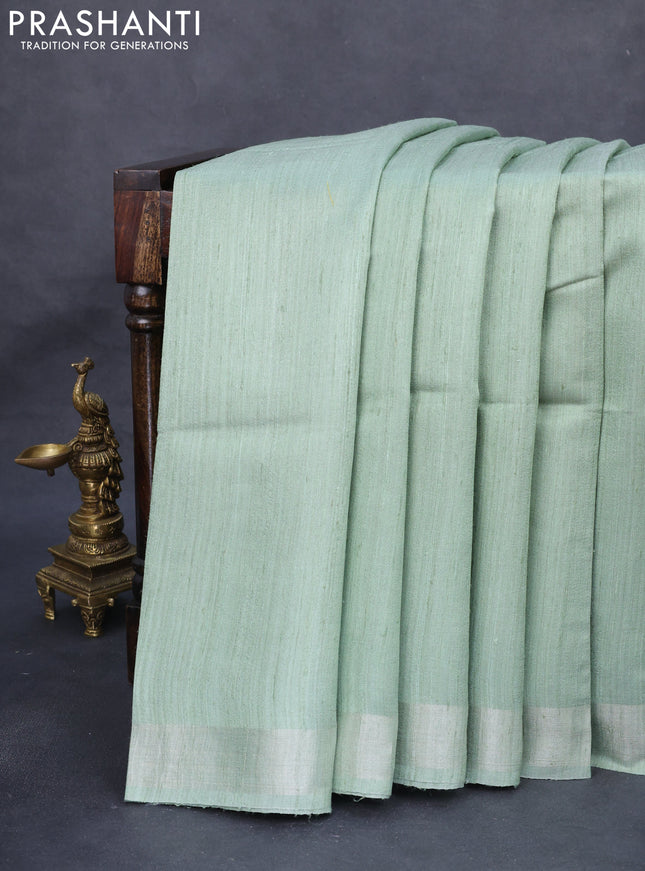 Pure dupion silk saree pastel green and beige with plain body and kalamkari printed pallu