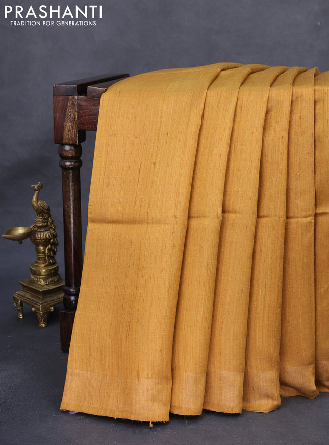 Pure dupion silk saree dark mustard with plain body and printed pallu