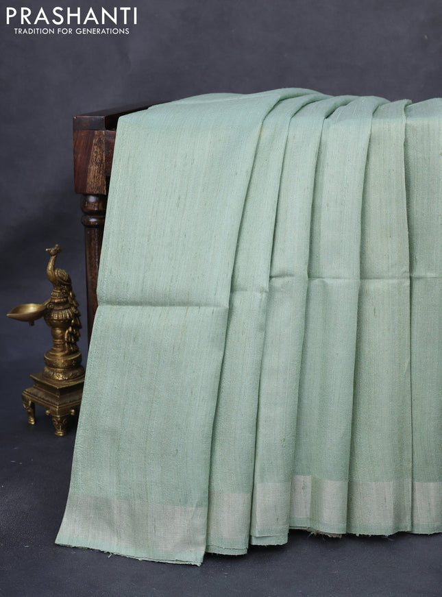 Pure dupion silk saree pastel green and multi colour with plain body and kalamkari printed pallu