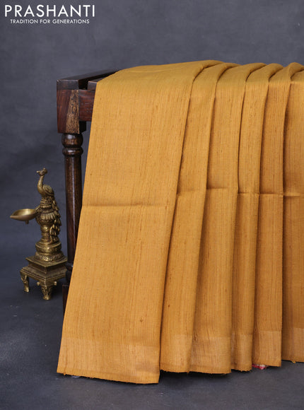 Pure dupion silk saree mustard yellow and beige with plain body and ikat printed pallu