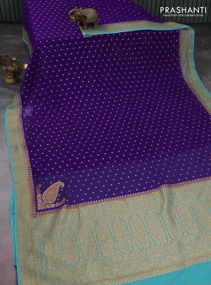 Banarasi georgette saree violet and teal blue with allover thread & zari woven buttas and woven border