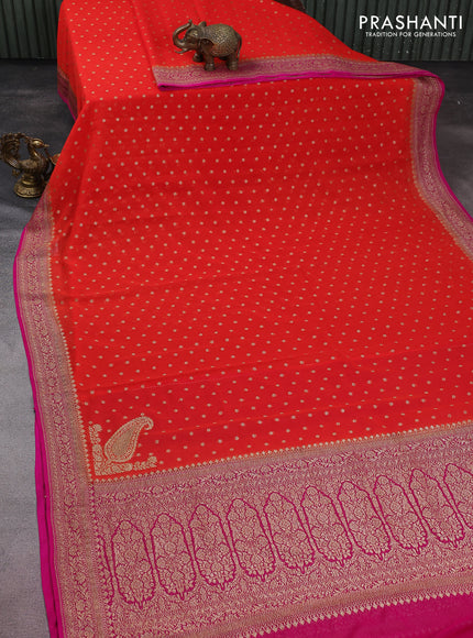 Banarasi georgette saree orange and pink with allover thread & zari woven buttas and woven border