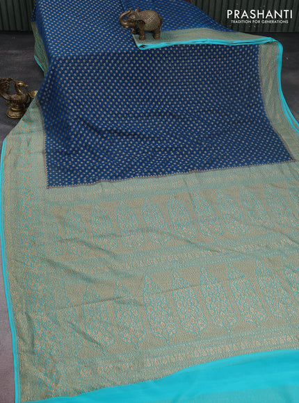 Banarasi georgette saree peacock blue and teal blue with allover thread & zari woven butta weaves and woven border