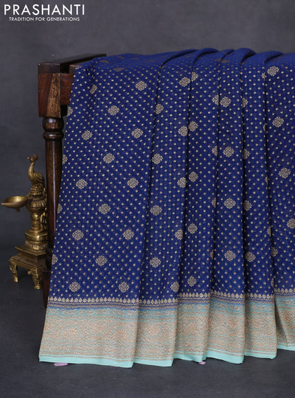Banarasi georgette saree blue and teal shade with allover thread & zari woven butta weaves and woven border