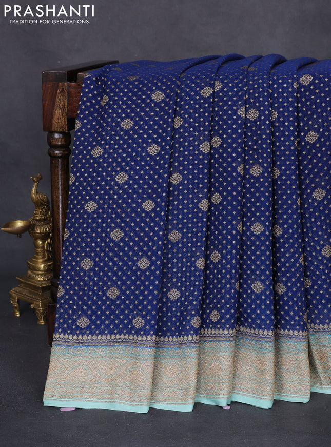 Banarasi georgette saree blue and teal shade with allover thread & zari woven butta weaves and woven border