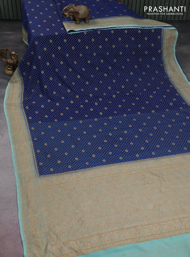 Banarasi georgette saree blue and teal shade with allover thread & zari woven butta weaves and woven border