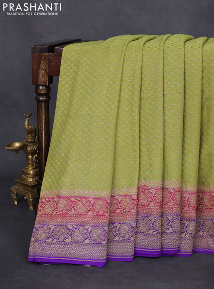 Banarasi georgette saree pista green and pink violet with allover thread & zari woven butta weaves and woven border