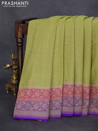 Banarasi georgette saree pista green and pink violet with allover thread & zari woven butta weaves and woven border