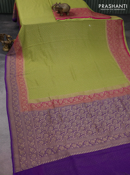 Banarasi georgette saree pista green and pink violet with allover thread & zari woven butta weaves and woven border