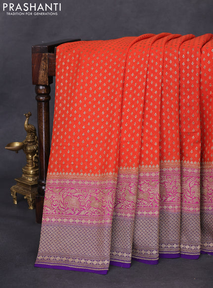 Banarasi georgette saree orange and violet with allover thread & zari woven butta weaves and long woven border